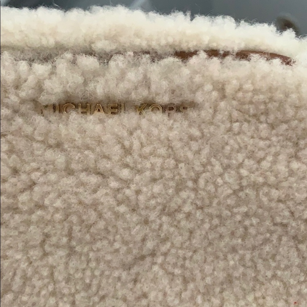 Michael Kors satchel.  fuzzy and off-white color